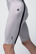 Close-up detail of Gobik Artic Stride bib shorts side panel with black stripe and Gobik logo