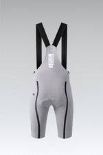 Gobik Artic Stride men's bib shorts in tapioca gray with black side stripes, rear view