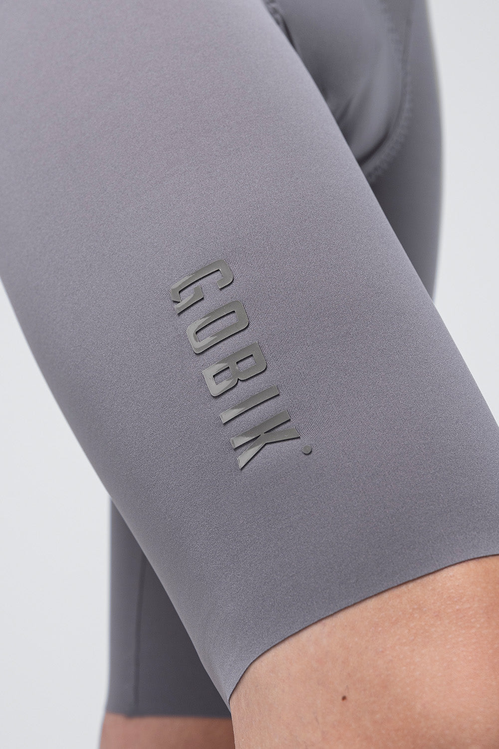 Gobik X Bib Short Men's in Kettle gray color showing embossed logo detail