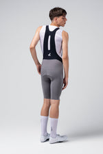 Gobik X Bib Short Men's in kettle gray color, rear view showing cycling shorts