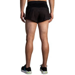 Brooks Sherpa 3-inch Split Short in black Surge colorway, rear view on male model