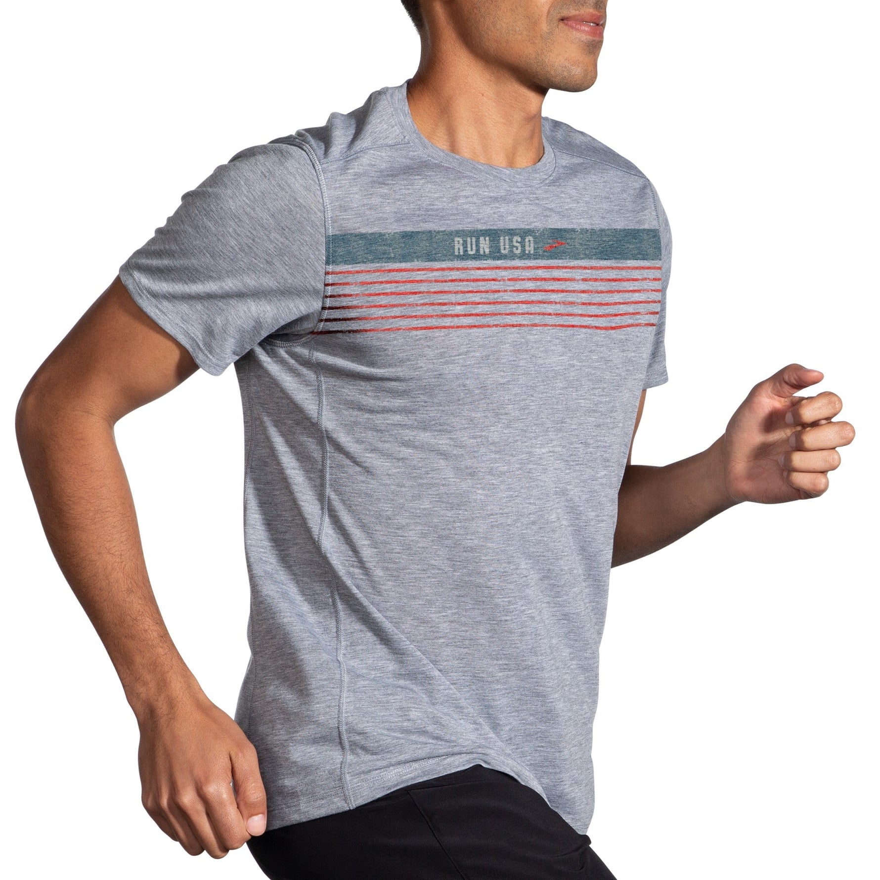 Man wearing gray Brooks Distance Graphic T-Shirt with striped RUN USA design