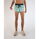 ChicknLegs men's turquoise running shorts with silly goose pattern and black waistband