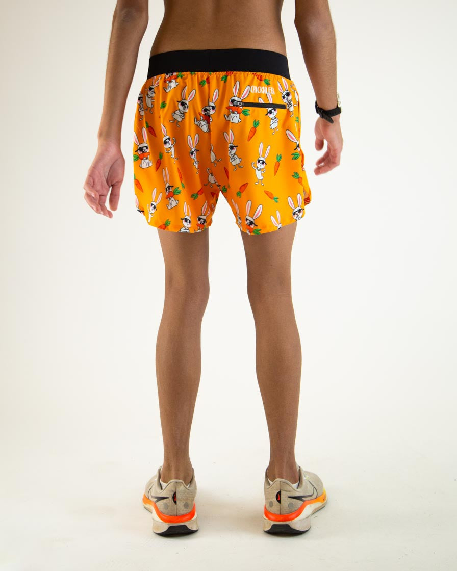 ChicknLegs 4-inch half split running shorts in orange Bad Bunny print, rear view