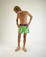 ChicknLegs men's green pickle print shorts with black waistband