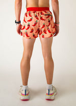 Men's orange running shorts with cartoon chili pepper print, back view