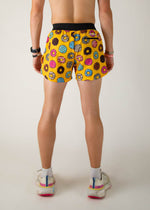 ChicknLegs men's yellow running shorts with colorful donut pattern, back view