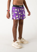 Purple running shorts with cute sloth pattern and black waistband on model