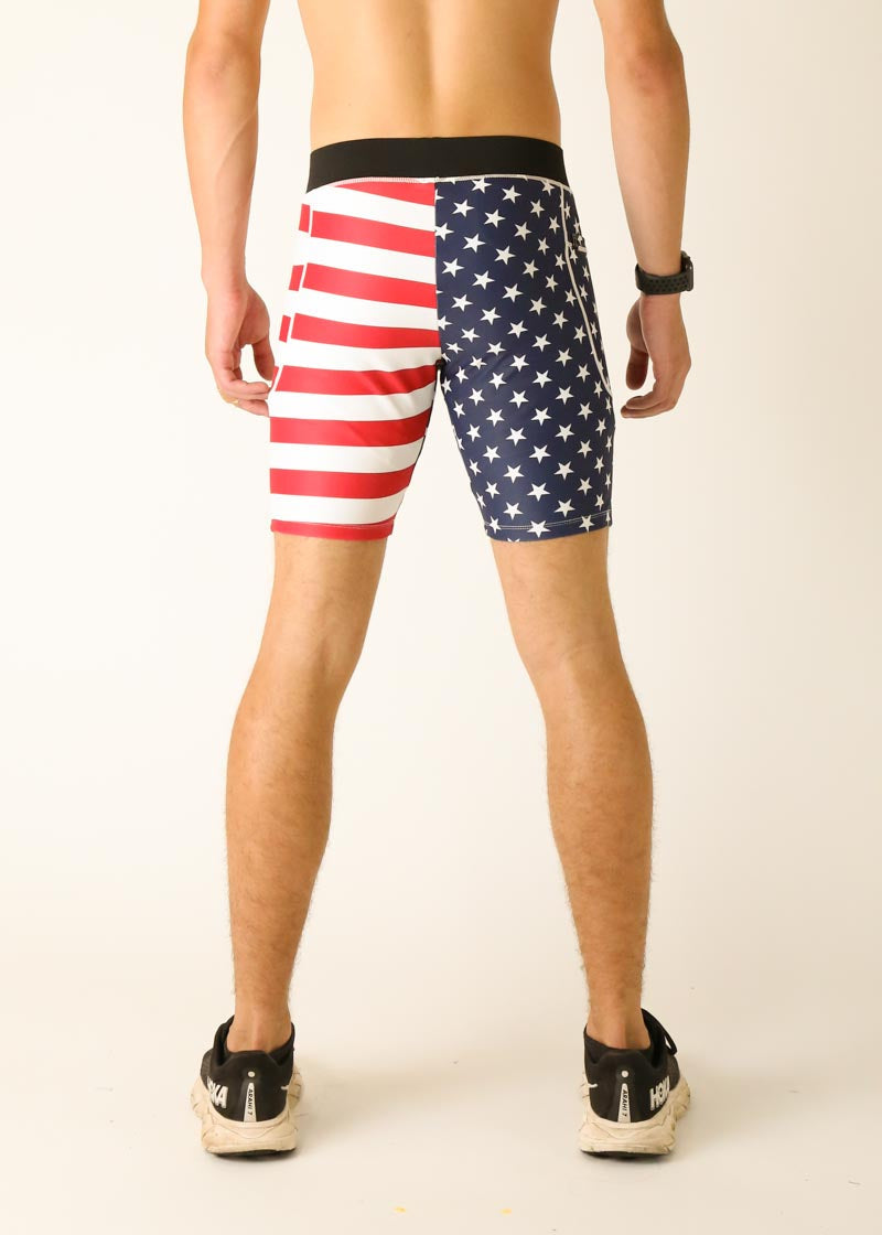 Men's compression shorts with American flag pattern on clean studio background