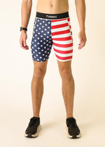 Man wearing ChicknLegs USA flag pattern compression shorts with stars and stripes design