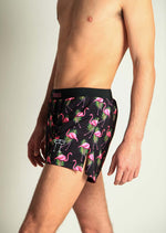 ChicknLegs men's black swim shorts with pink flamingo and tropical leaf print
