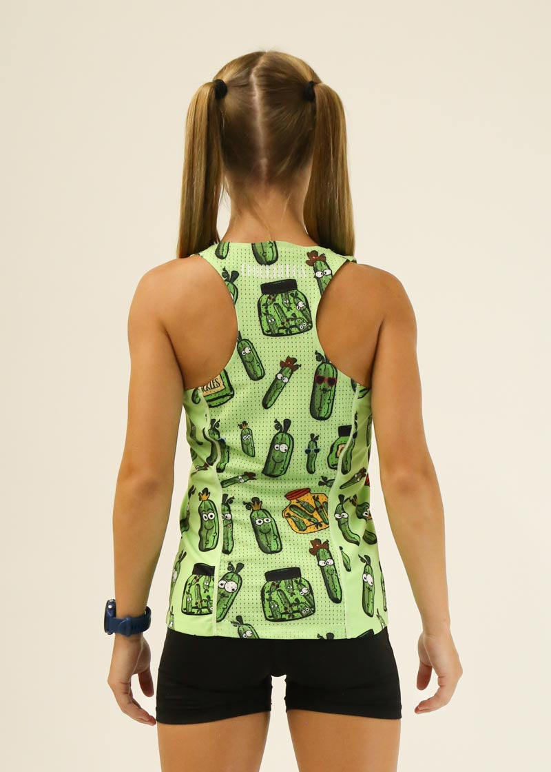 Woman wearing light green racerback tank with cartoon pickle pattern, shown from behind