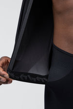 Interior detail of Gobik black cycling jersey hem showing silicone gripper and inner lining