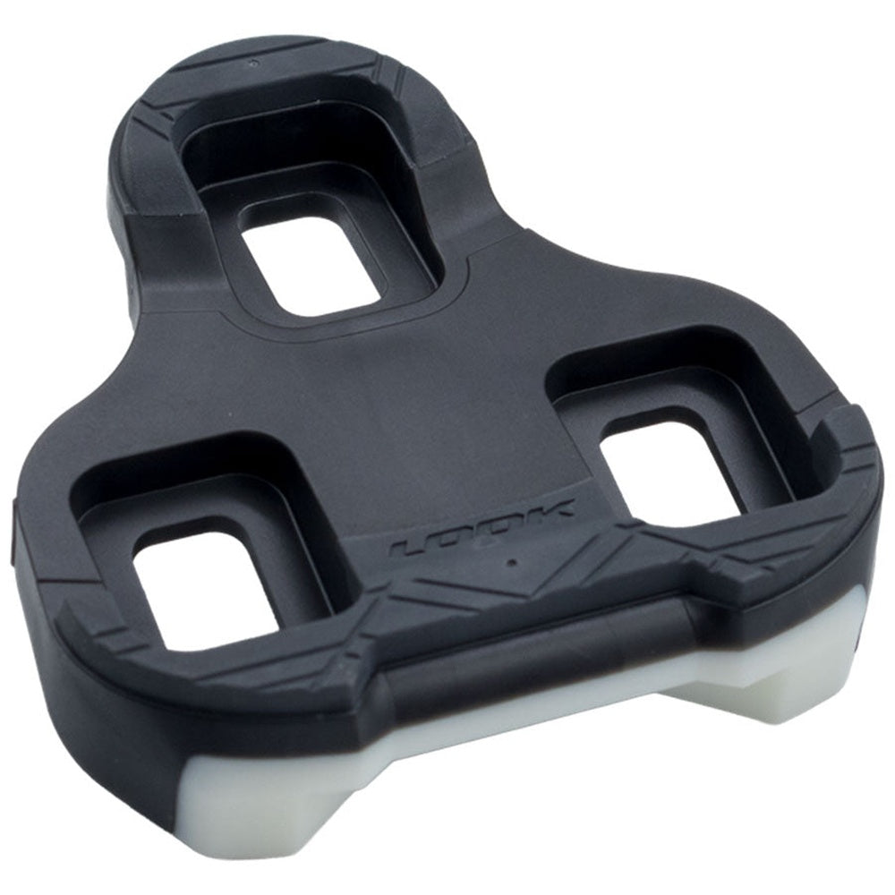 LOOK Keo Grip cycling cleat in black with white tri-material contact surface, angled view