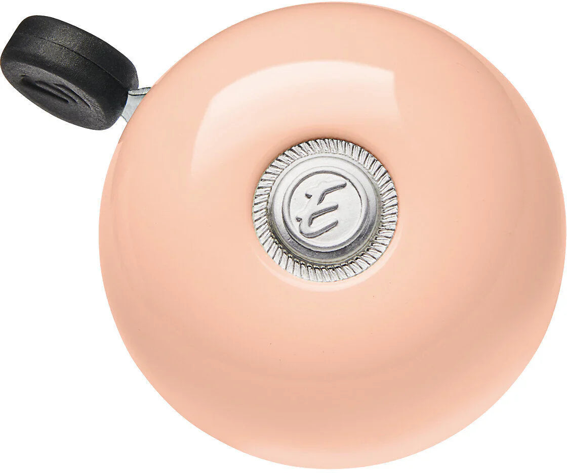 Electra pink bicycle bell with silver center button and black striker