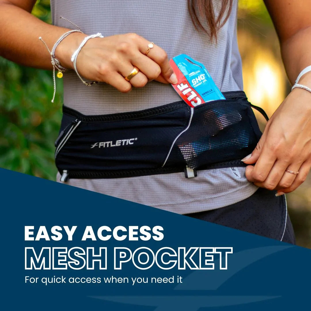 Fitletic 360 Plus black belt showing easy-access mesh pocket with energy gel being inserted