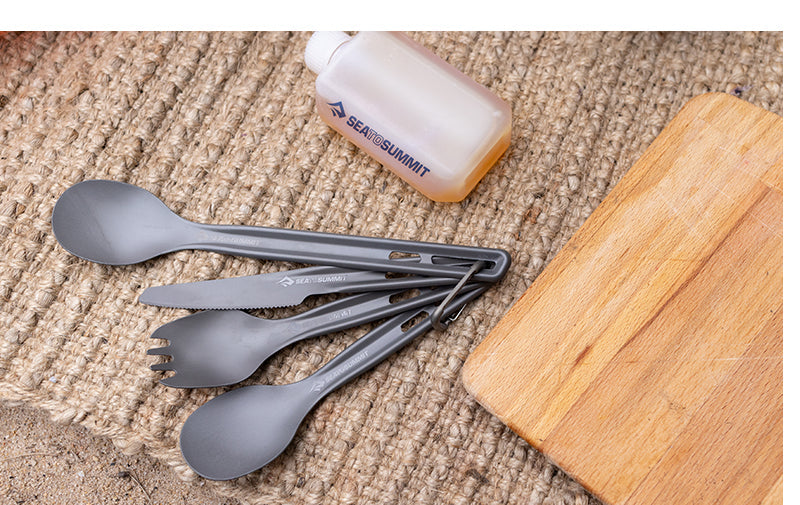 Sea to Summit gray ultralight cutlery set with spoon, fork, knife and cutting board