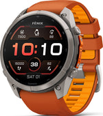 Garmin Fenix smartwatch with titanium case and orange silicone band showing time display