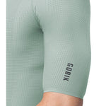 Gobik Phantom Jersey sleeve detail showing textured fabric and GOBIK branding in sage green