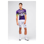 Male model wearing Gobik CX Pro 4.0 violet jersey with white Wilier Vittoria bib shorts full outfit
