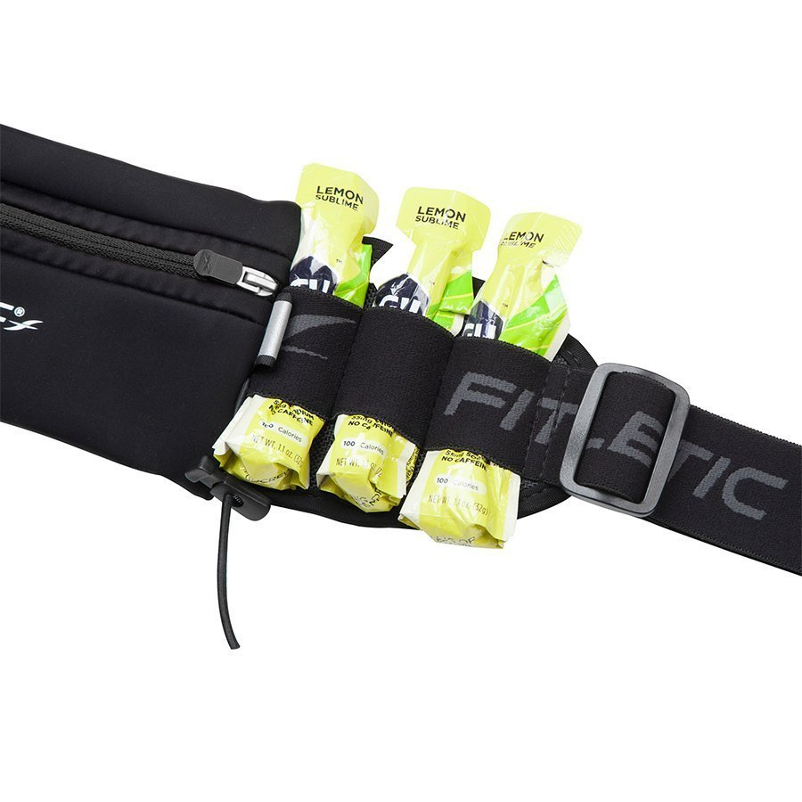 Close-up of Fitletic black running belt holding multiple lemon energy gel packets in side loops