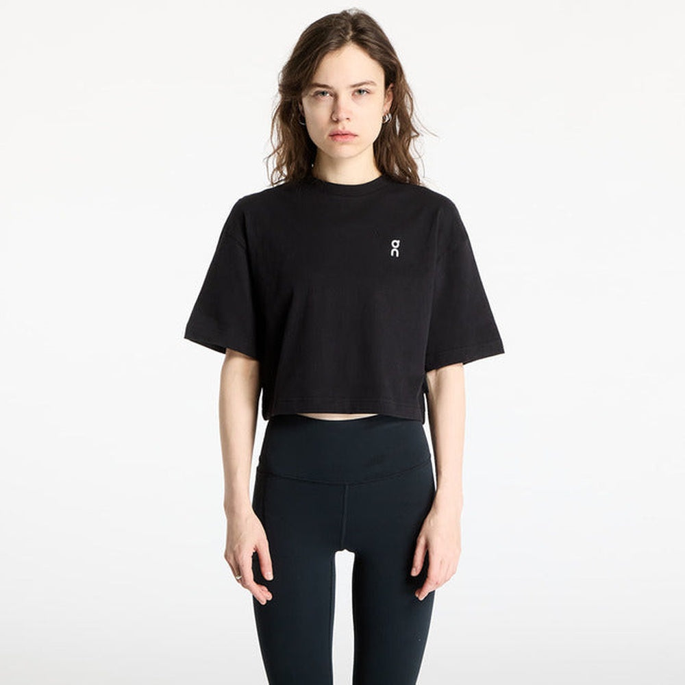 On Running Club Boxy-T black cropped t-shirt worn by female model on white background