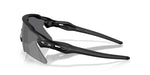 Oakley Radar EV Heater sunglasses in matte black with Prizm Black polarized lenses, side angle view