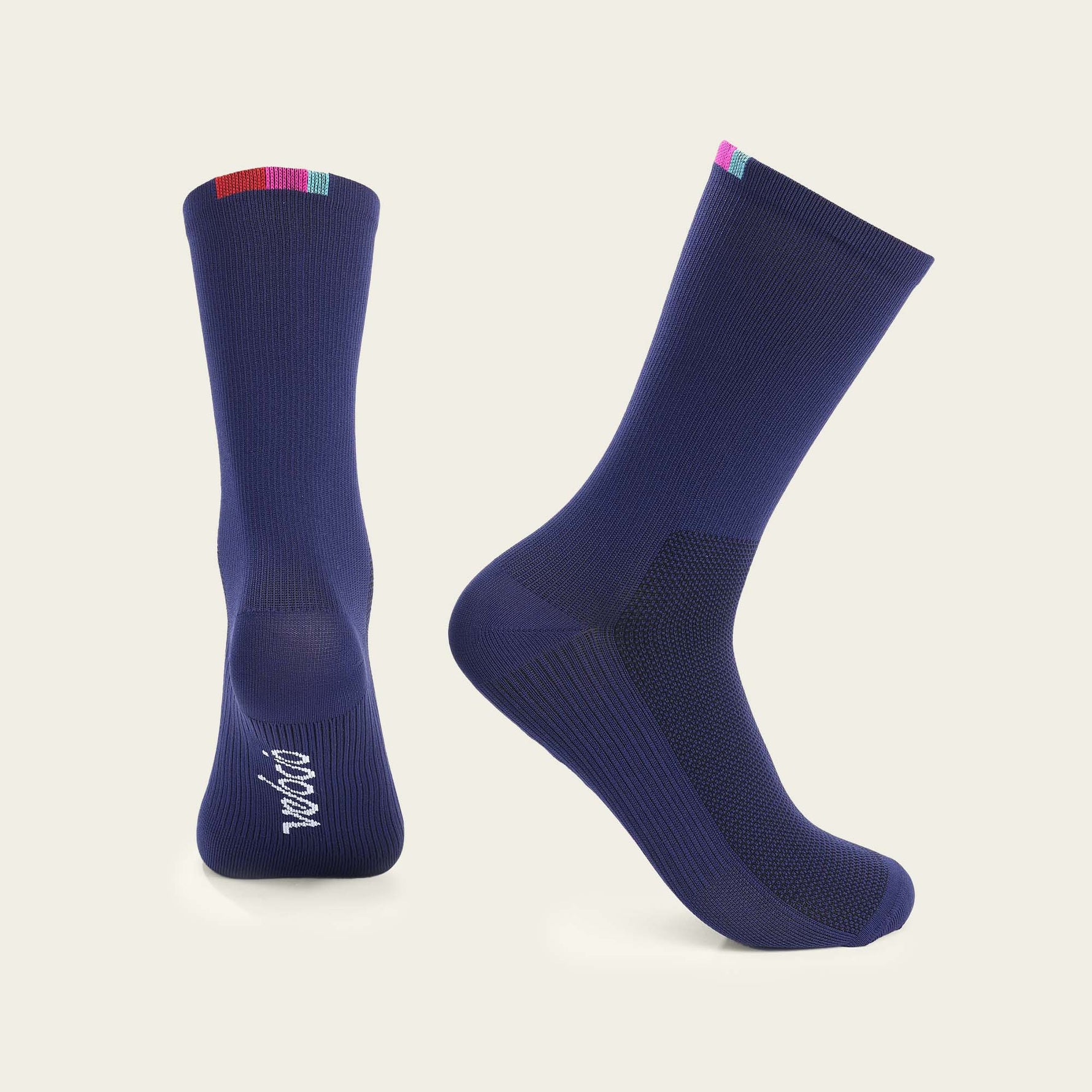 Velocio navy blue cycling socks with colorful cuff stripes on clean background