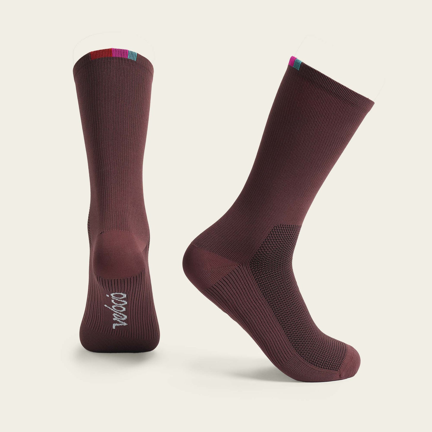 Velocio cycling socks in burgundy with colorful striped cuff and textured sole