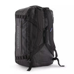 Patagonia Black Hole Duffel 55L showing backpack harness straps on rear panel in black