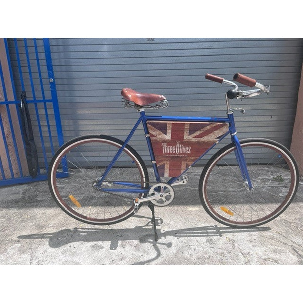 Custom Three Olives Vodka bar cruiser bike in metallic royal blue, full side view