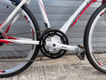 White perforated road saddle on Giordano Libero 1.6 youth road bike