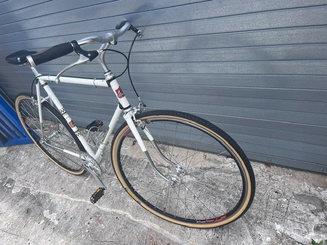 Crank and single speed drivetrain on vintage French Peugeot UO-8 steel bike