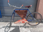 Chrome horn and handlebar detail on Three Olives custom bar cruiser