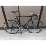 Vintage 1980s Schwinn World Sport 12-speed road bike in black, full side view