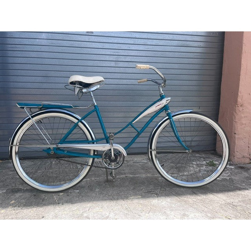 1960 J.C. Higgins Flightliner ladies tank cruiser in teal, full side view