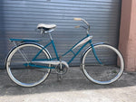 1960 J.C. Higgins Flightliner ladies tank cruiser in teal, full side view
