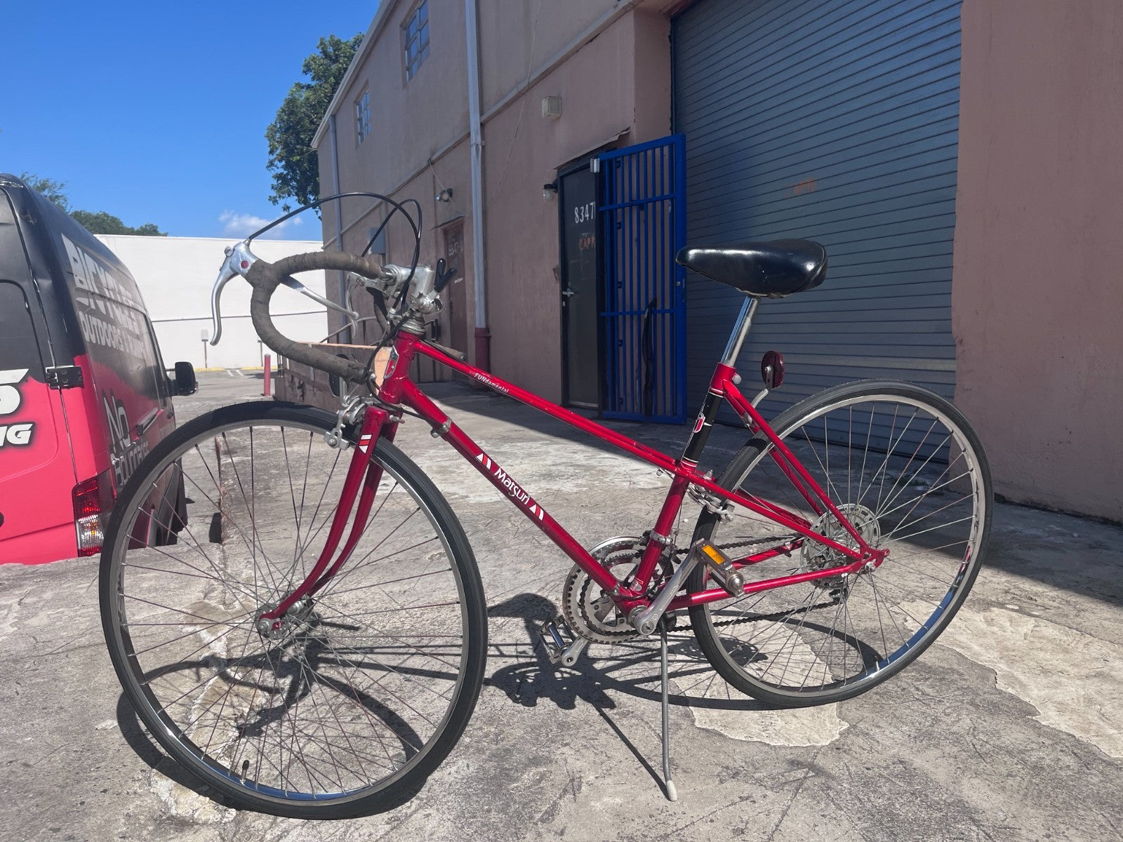 Matsuri FUNdamental Mixte 10-speed side profile showing red lugged steel step-through frame
