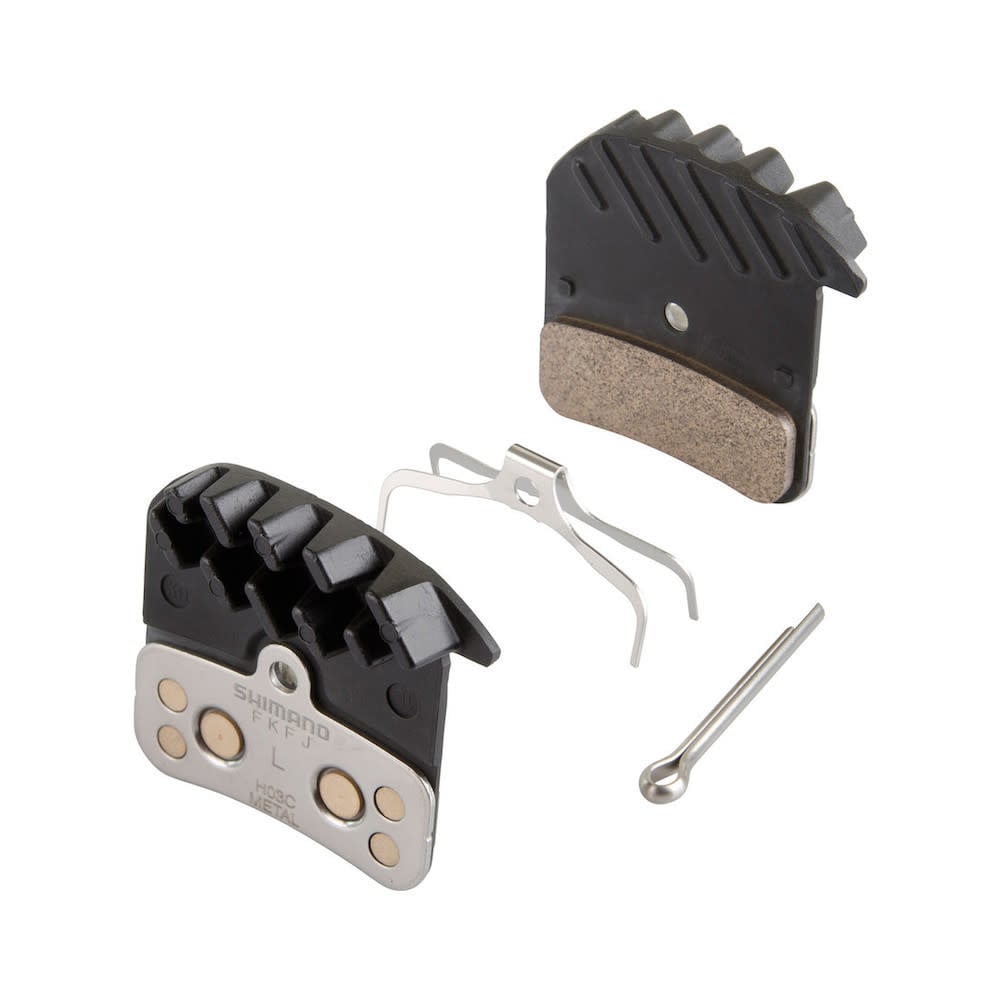Shimano H03C metal disc brake pads with cooling fins, spring, and split pin