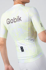 Gobik cycling jersey in white with yellow tropical pattern, rear view