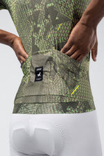 Gobik CX Pro 4.0 cycling jersey in green grid pattern with professional studio lighting