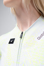 Gobik CX Pro cycling jersey in white with yellow speckled pattern, close-up of zipper detail