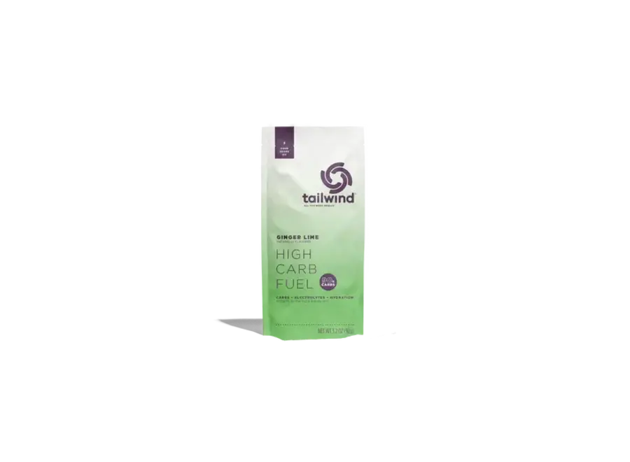 Tailwind Nutrition High Carb Fuel Ginger Lime single pouch shown at slight angle on dark background