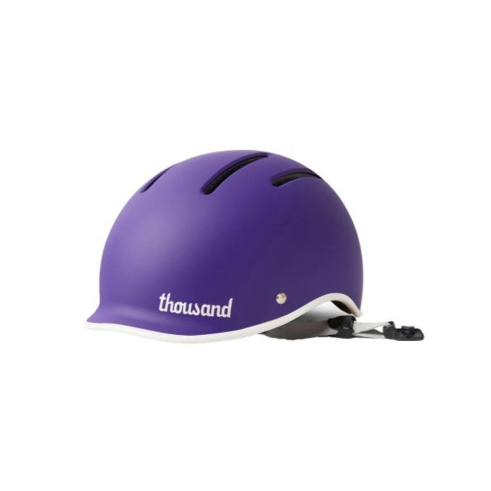 Thousand JR Kids Helmet in matte purple with white trim on white background