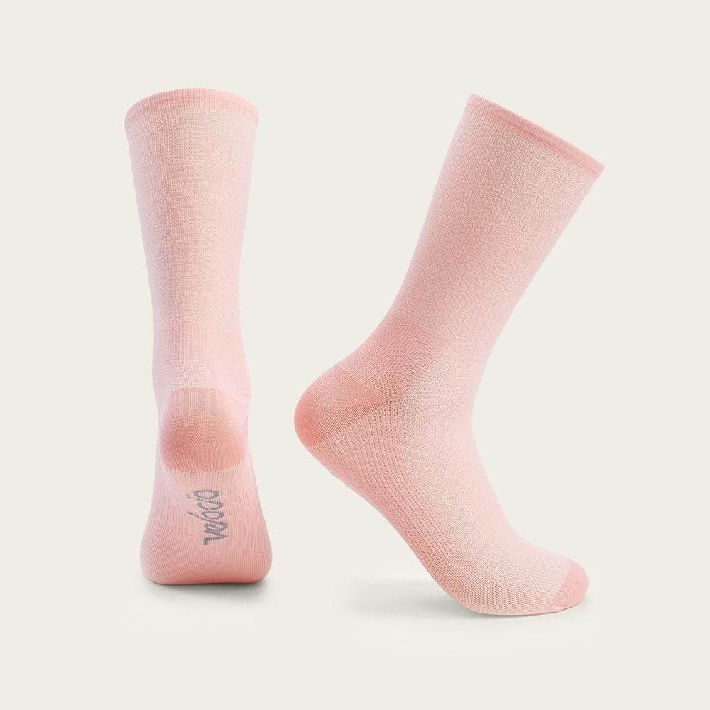 Velocio Ultralight cycling socks in misty rose pink color on clean background