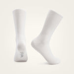 Two white Velocio Ultralight cycling socks displayed against neutral background