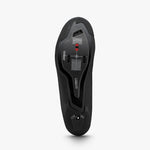Shimano RC703 black cycling shoe sole view showing carbon stiffness plate and cleat mount