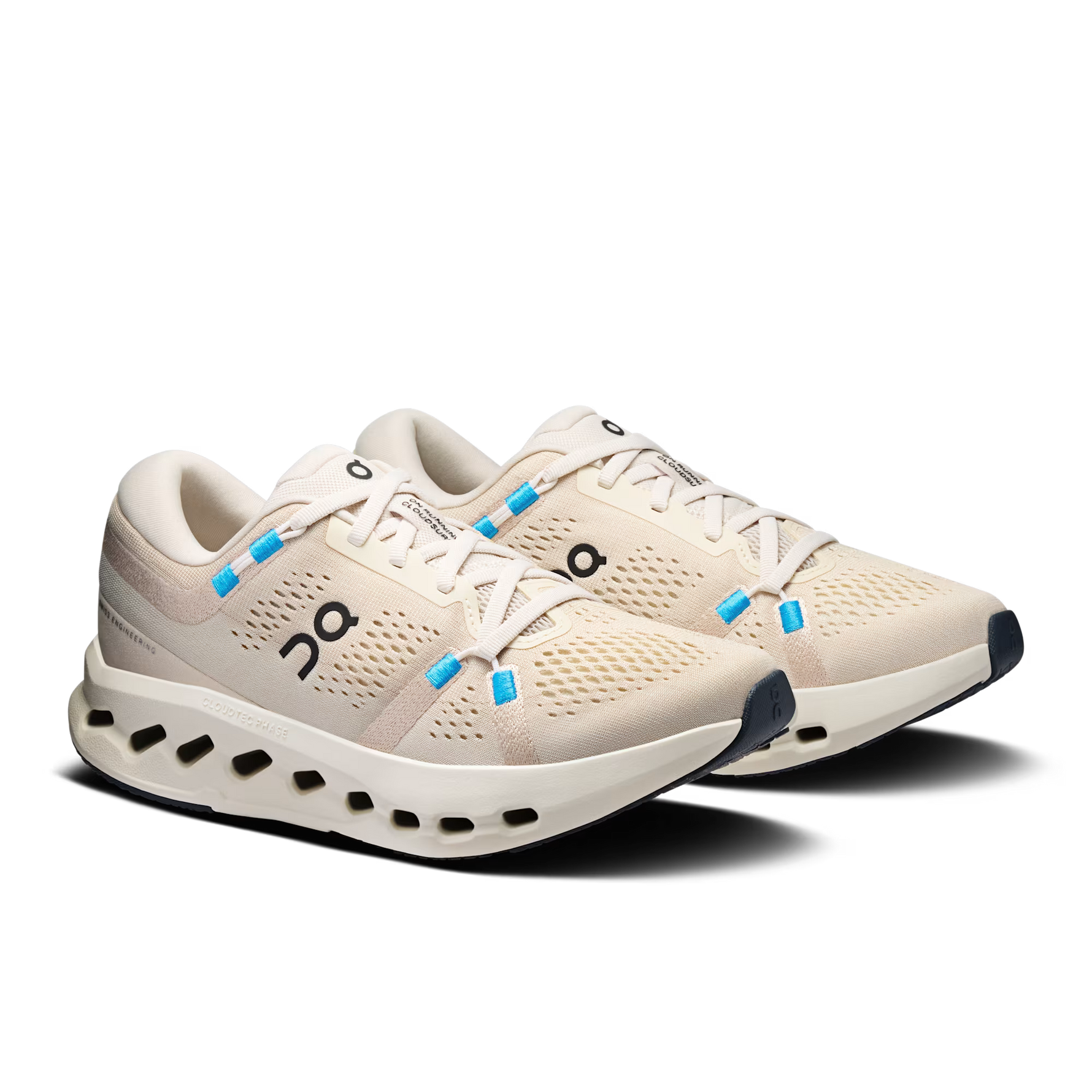 On Cloudsurfer 2 women's running shoes in pearl ivory colorway with blue lace loops