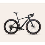 X-LAB GT8 gravel bike in matte black with tan sidewall tires on neutral background